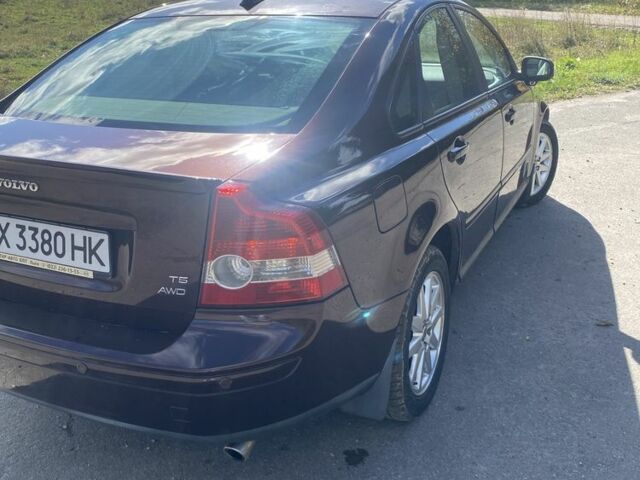 Вольво С40 2006 в Староконстантинов на Automoto.ua Красный Вольво С40, объемом двигателя 2.5 л и пробегом 266 тыс. км за 5000 $, фото 3 на Automoto.ua
