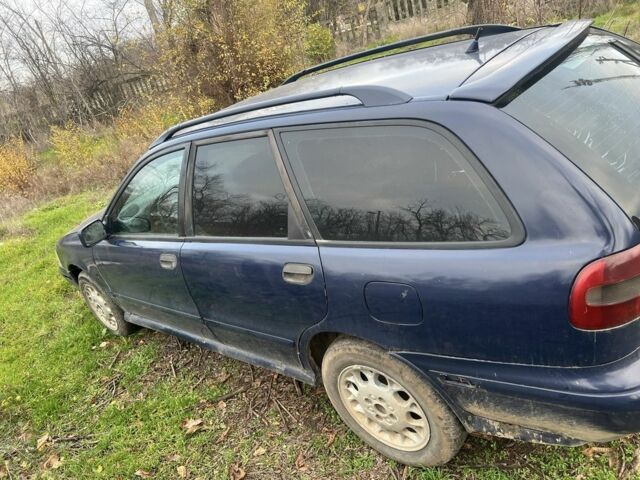 Синий Вольво С40, объемом двигателя 1.9 л и пробегом 100 тыс. км за 600 $, фото 4 на Automoto.ua