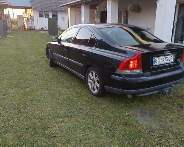 Черный Вольво С60, объемом двигателя 2.4 л и пробегом 345 тыс. км за 3500 $, фото 2 на Automoto.ua