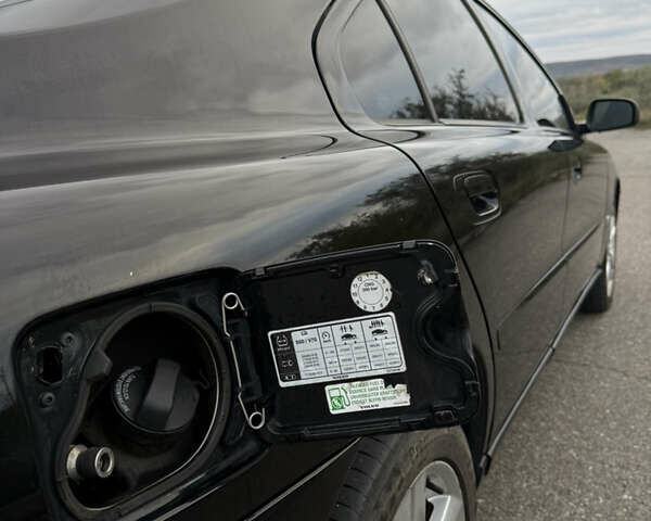 Черный Вольво С60, объемом двигателя 2.4 л и пробегом 348 тыс. км за 6350 $, фото 51 на Automoto.ua