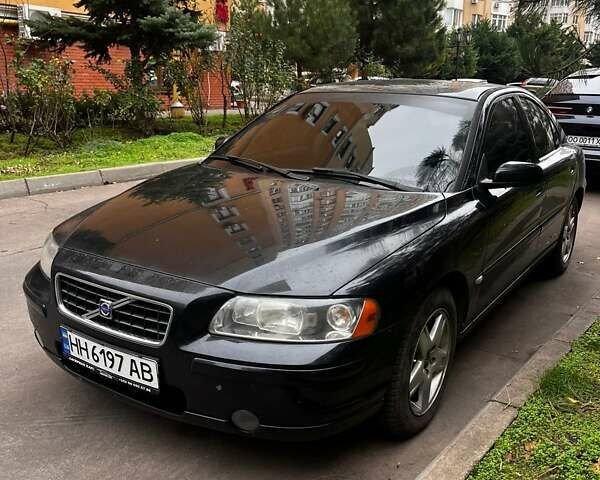 Черный Вольво С60, объемом двигателя 2.4 л и пробегом 245 тыс. км за 6499 $, фото 1 на Automoto.ua