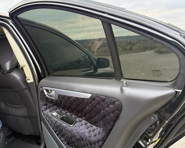 Черный Вольво С60, объемом двигателя 2.4 л и пробегом 348 тыс. км за 6350 $, фото 65 на Automoto.ua