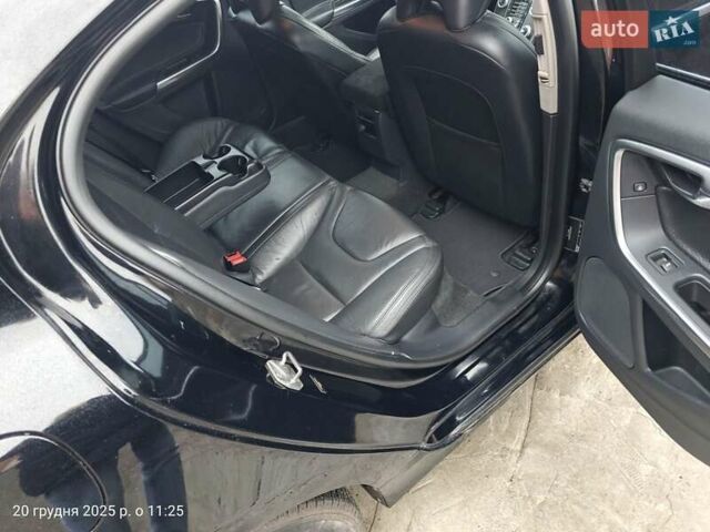 Черный Вольво С60, объемом двигателя 2.5 л и пробегом 100 тыс. км за 15500 $, фото 1 на Automoto.ua