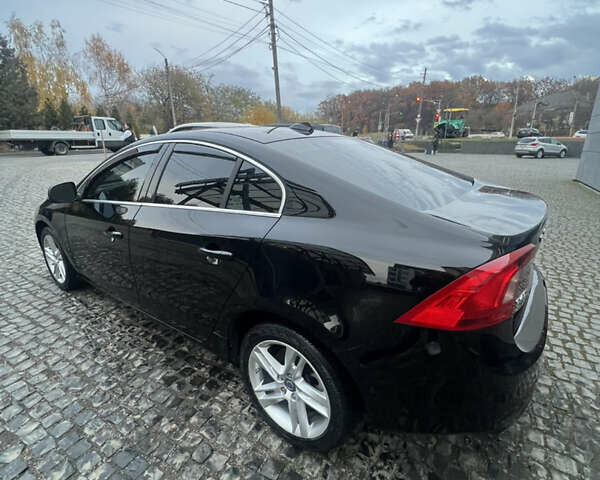 Черный Вольво С60, объемом двигателя 2.5 л и пробегом 155 тыс. км за 12599 $, фото 1 на Automoto.ua