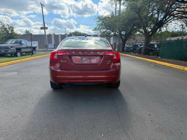 Красный Вольво С60, объемом двигателя 2.5 л и пробегом 70 тыс. км за 7000 $, фото 5 на Automoto.ua