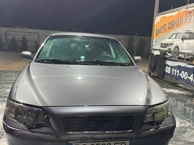 Серый Вольво С60, объемом двигателя 2.5 л и пробегом 340 тыс. км за 5300 $, фото 1 на Automoto.ua