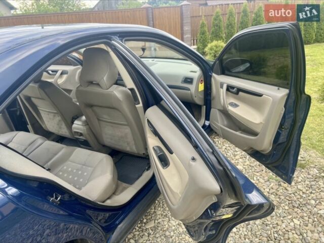 Синий Вольво С60, объемом двигателя 2.4 л и пробегом 390 тыс. км за 4500 $, фото 21 на Automoto.ua