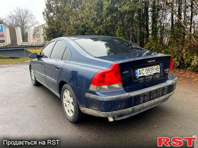 Синий Вольво С60, объемом двигателя 2.4 л и пробегом 315 тыс. км за 5300 $, фото 3 на Automoto.ua