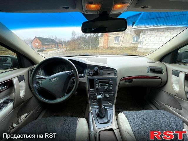 Синий Вольво С60, объемом двигателя 2.4 л и пробегом 315 тыс. км за 5300 $, фото 1 на Automoto.ua