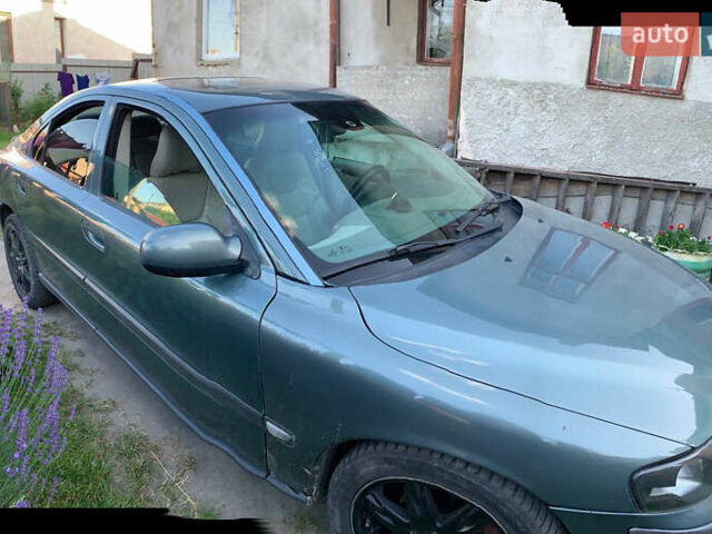Зеленый Вольво С60, объемом двигателя 2.4 л и пробегом 250 тыс. км за 3399 $, фото 3 на Automoto.ua