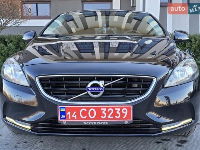 Чорний Вольво V40, об'ємом двигуна 1.56 л та пробігом 262 тис. км за 11199 $, фото 114 на Automoto.ua