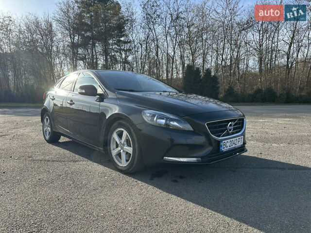 Чорний Вольво V40, об'ємом двигуна 1.97 л та пробігом 228 тис. км за 11500 $, фото 1 на Automoto.ua