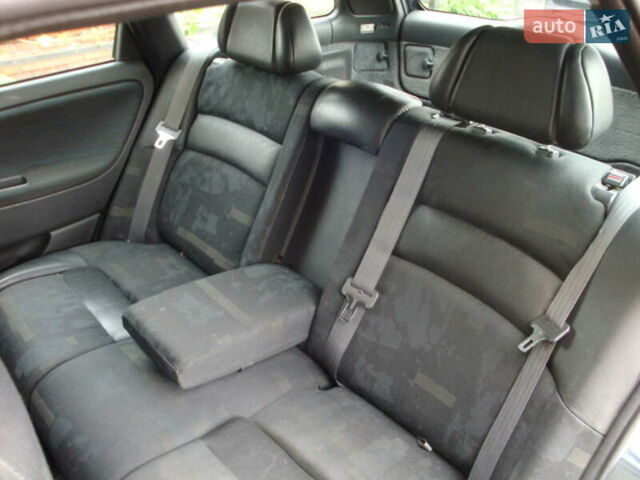 Черный Вольво В40, объемом двигателя 1.8 л и пробегом 219 тыс. км за 3600 $, фото 18 на Automoto.ua