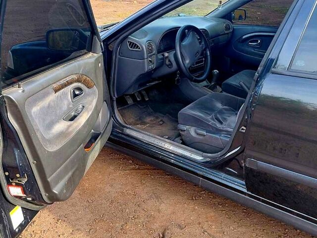 Чорний Вольво V40, об'ємом двигуна 1.8 л та пробігом 315 тис. км за 3800 $, фото 7 на Automoto.ua