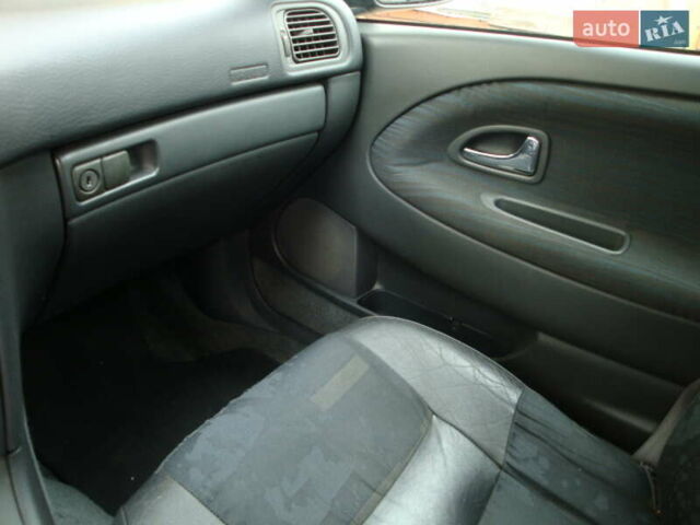 Черный Вольво В40, объемом двигателя 1.8 л и пробегом 219 тыс. км за 3600 $, фото 19 на Automoto.ua