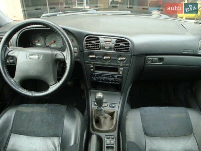 Черный Вольво В40, объемом двигателя 1.8 л и пробегом 219 тыс. км за 3600 $, фото 13 на Automoto.ua