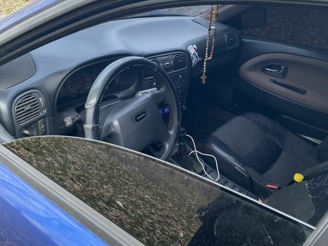 Синий Вольво В40, объемом двигателя 1.8 л и пробегом 348 тыс. км за 2899 $, фото 4 на Automoto.ua