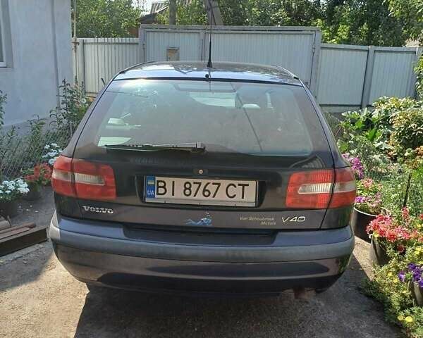 Синий Вольво В40, объемом двигателя 1.9 л и пробегом 254 тыс. км за 2800 $, фото 3 на Automoto.ua