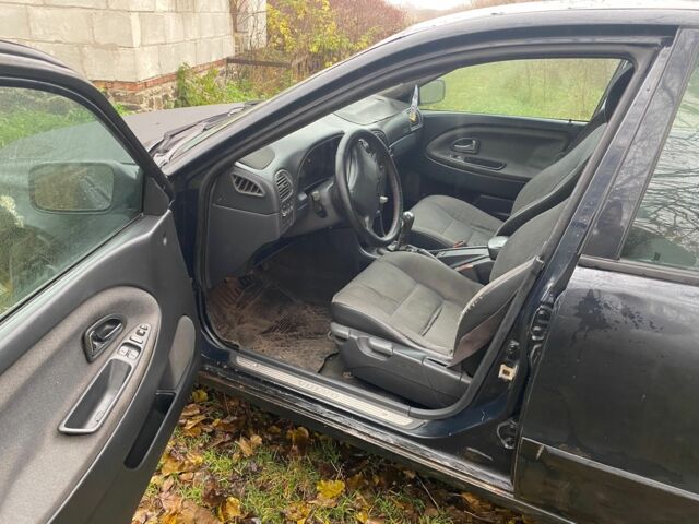 Синий Вольво В40, объемом двигателя 1.9 л и пробегом 380 тыс. км за 1450 $, фото 7 на Automoto.ua