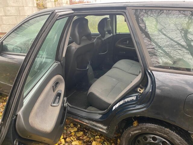 Синий Вольво В40, объемом двигателя 1.9 л и пробегом 380 тыс. км за 1450 $, фото 6 на Automoto.ua