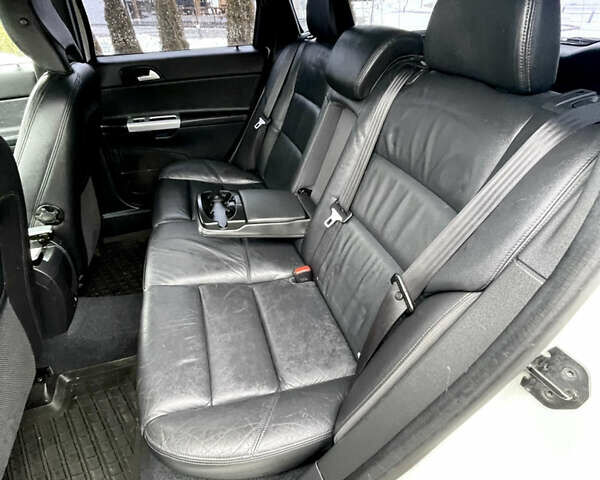 Білий Вольво V50, об'ємом двигуна 2 л та пробігом 214 тис. км за 9990 $, фото 33 на Automoto.ua