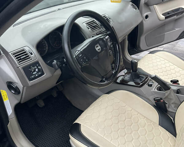 Черный Вольво В50, объемом двигателя 2 л и пробегом 245 тыс. км за 4450 $, фото 34 на Automoto.ua