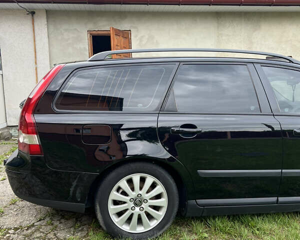 Черный Вольво В50, объемом двигателя 1.6 л и пробегом 339 тыс. км за 5400 $, фото 4 на Automoto.ua