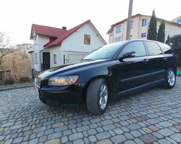 Черный Вольво В50, объемом двигателя 2 л и пробегом 290 тыс. км за 4800 $, фото 2 на Automoto.ua