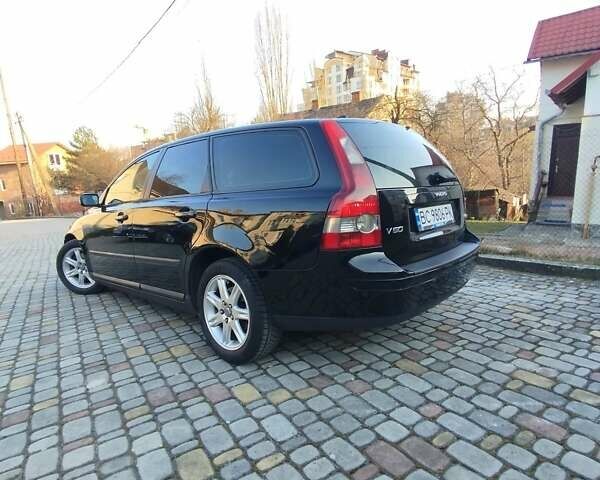 Черный Вольво В50, объемом двигателя 2 л и пробегом 290 тыс. км за 4800 $, фото 4 на Automoto.ua