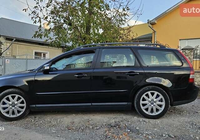 Черный Вольво В50, объемом двигателя 1.56 л и пробегом 200 тыс. км за 5900 $, фото 1 на Automoto.ua