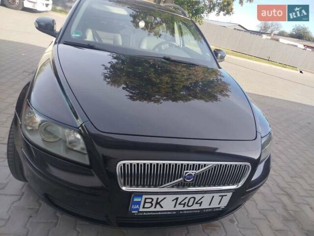 Черный Вольво В50, объемом двигателя 1.8 л и пробегом 263 тыс. км за 5900 $, фото 2 на Automoto.ua
