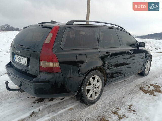 Черный Вольво В50, объемом двигателя 1.56 л и пробегом 475 тыс. км за 4100 $, фото 1 на Automoto.ua
