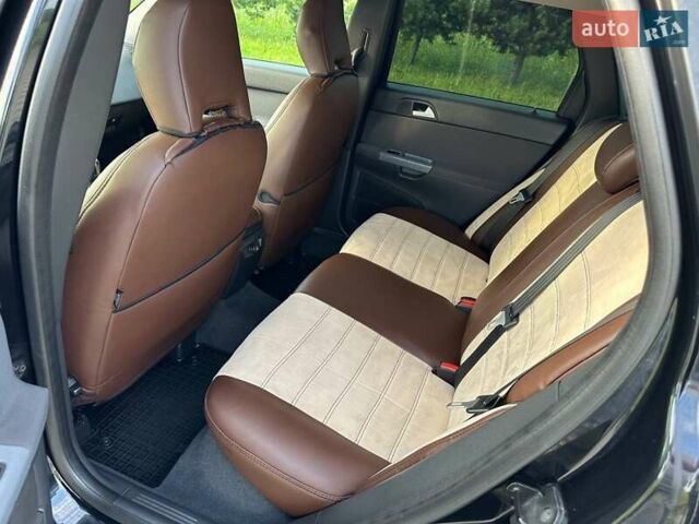 Черный Вольво В50, объемом двигателя 1.56 л и пробегом 316 тыс. км за 6000 $, фото 22 на Automoto.ua