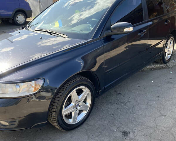 Чорний Вольво V50, об'ємом двигуна 1.56 л та пробігом 273 тис. км за 6500 $, фото 1 на Automoto.ua