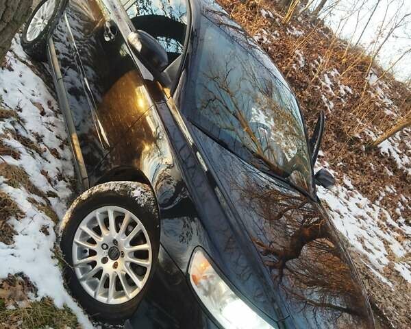 Черный Вольво В50, объемом двигателя 1.6 л и пробегом 278 тыс. км за 6600 $, фото 1 на Automoto.ua