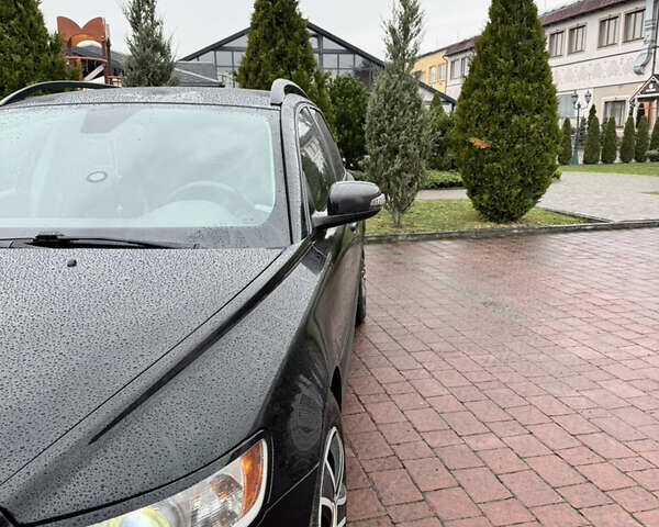 Черный Вольво В50, объемом двигателя 1.6 л и пробегом 324 тыс. км за 5799 $, фото 2 на Automoto.ua