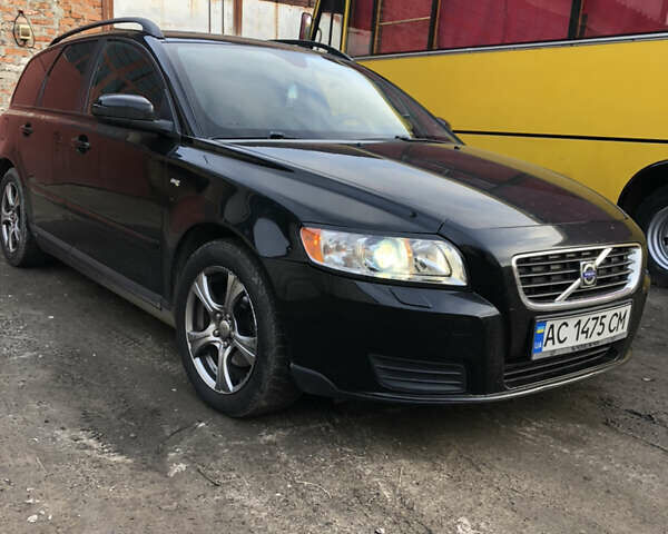 Черный Вольво В50, объемом двигателя 1.56 л и пробегом 310 тыс. км за 5150 $, фото 1 на Automoto.ua