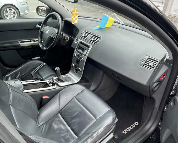 Черный Вольво В50, объемом двигателя 1.6 л и пробегом 322 тыс. км за 4800 $, фото 12 на Automoto.ua