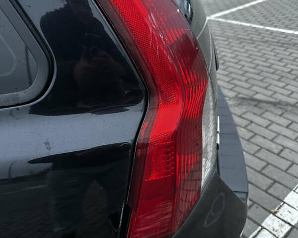 Черный Вольво В50, объемом двигателя 1.56 л и пробегом 282 тыс. км за 5299 $, фото 18 на Automoto.ua