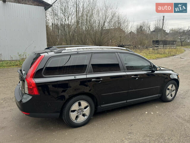 Черный Вольво В50, объемом двигателя 1.56 л и пробегом 213 тыс. км за 6599 $, фото 12 на Automoto.ua