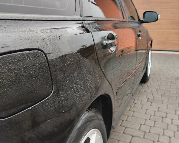 Чорний Вольво V50, об'ємом двигуна 1.6 л та пробігом 235 тис. км за 6100 $, фото 2 на Automoto.ua