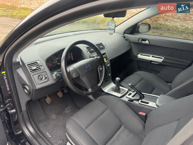 Черный Вольво В50, объемом двигателя 1.56 л и пробегом 213 тыс. км за 6599 $, фото 37 на Automoto.ua