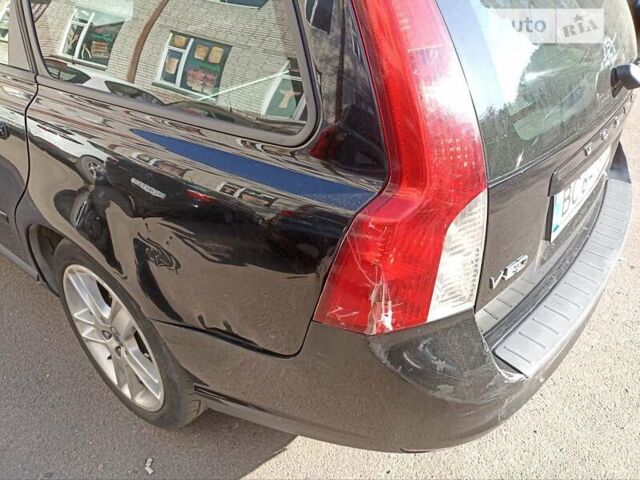 Черный Вольво В50, объемом двигателя 1.56 л и пробегом 297 тыс. км за 6300 $, фото 1 на Automoto.ua