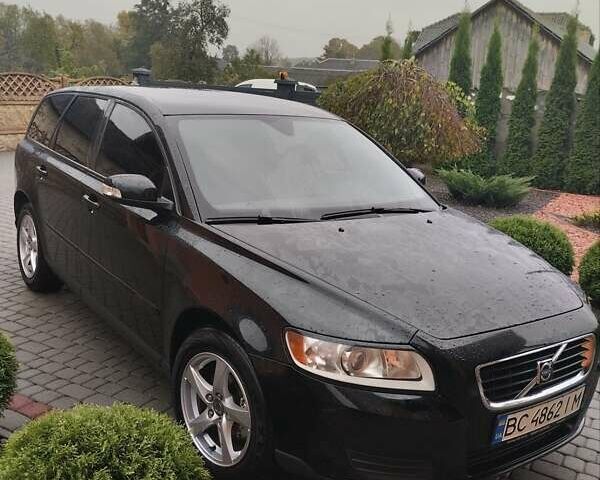 Черный Вольво В50, объемом двигателя 1.56 л и пробегом 235 тыс. км за 6200 $, фото 1 на Automoto.ua