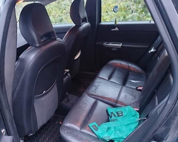 Черный Вольво В50, объемом двигателя 2 л и пробегом 306 тыс. км за 7500 $, фото 3 на Automoto.ua