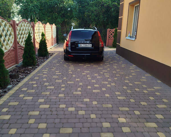 Черный Вольво В50, объемом двигателя 1.6 л и пробегом 233 тыс. км за 7300 $, фото 1 на Automoto.ua