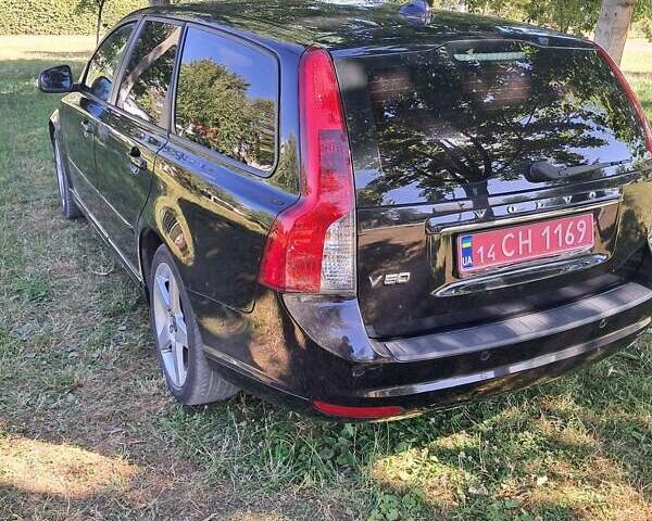 Черный Вольво В50, объемом двигателя 1.6 л и пробегом 261 тыс. км за 7000 $, фото 5 на Automoto.ua
