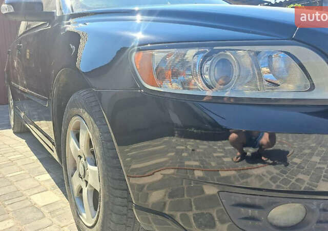 Черный Вольво В50, объемом двигателя 1.56 л и пробегом 237 тыс. км за 7000 $, фото 1 на Automoto.ua