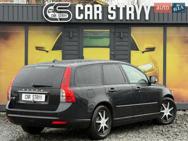 Черный Вольво В50, объемом двигателя 1.6 л и пробегом 263 тыс. км за 6999 $, фото 1 на Automoto.ua