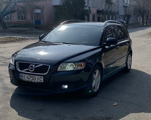 Черный Вольво В50, объемом двигателя 1.56 л и пробегом 270 тыс. км за 8100 $, фото 1 на Automoto.ua